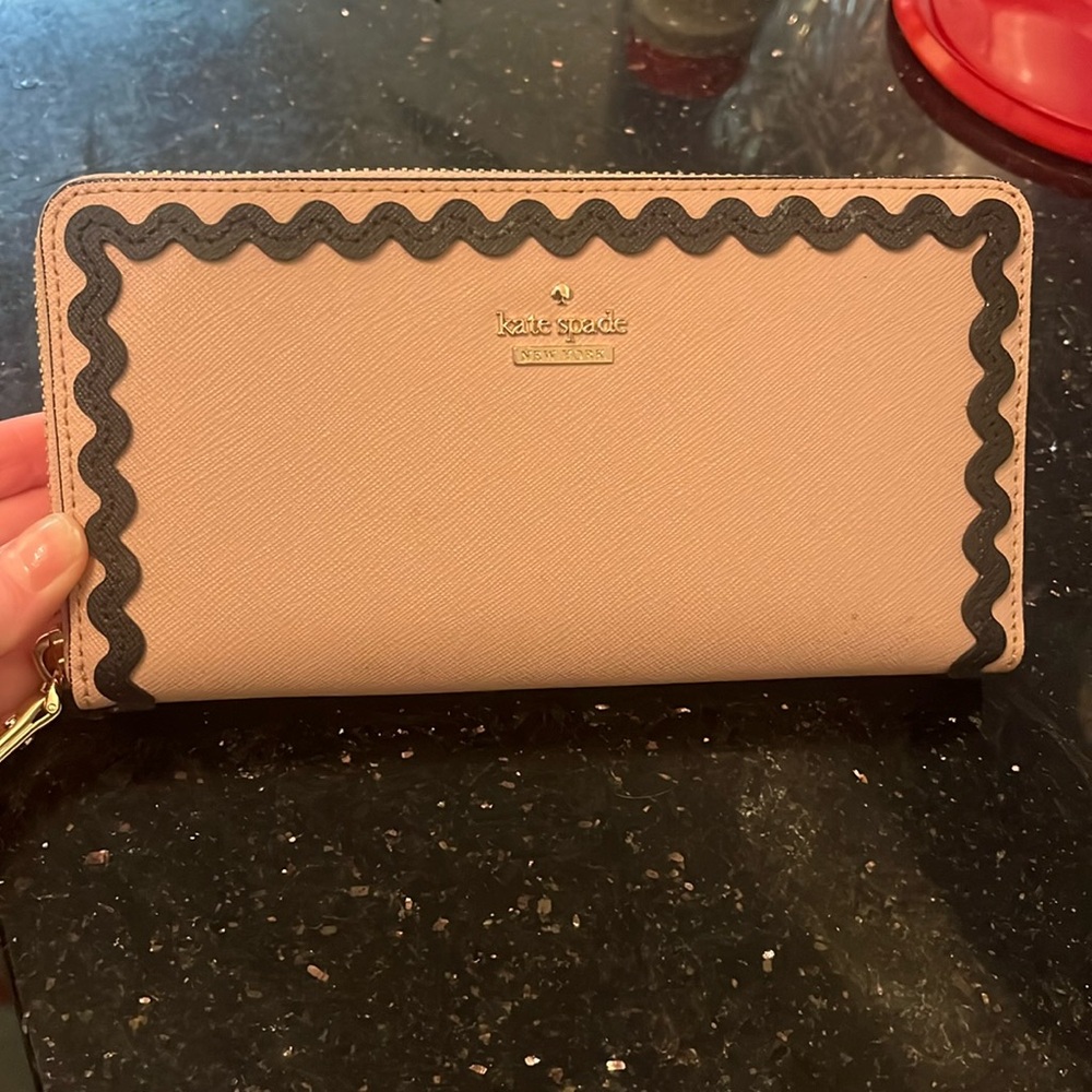 Pink Kate spade wallet with lots of pockets!